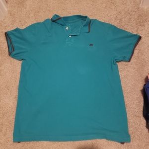 A&E teal polo
